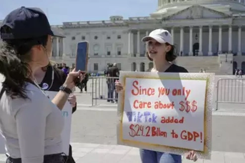 A TikTok Content Creator Protesting Against Potential TokTok Ban Bill in USA.  